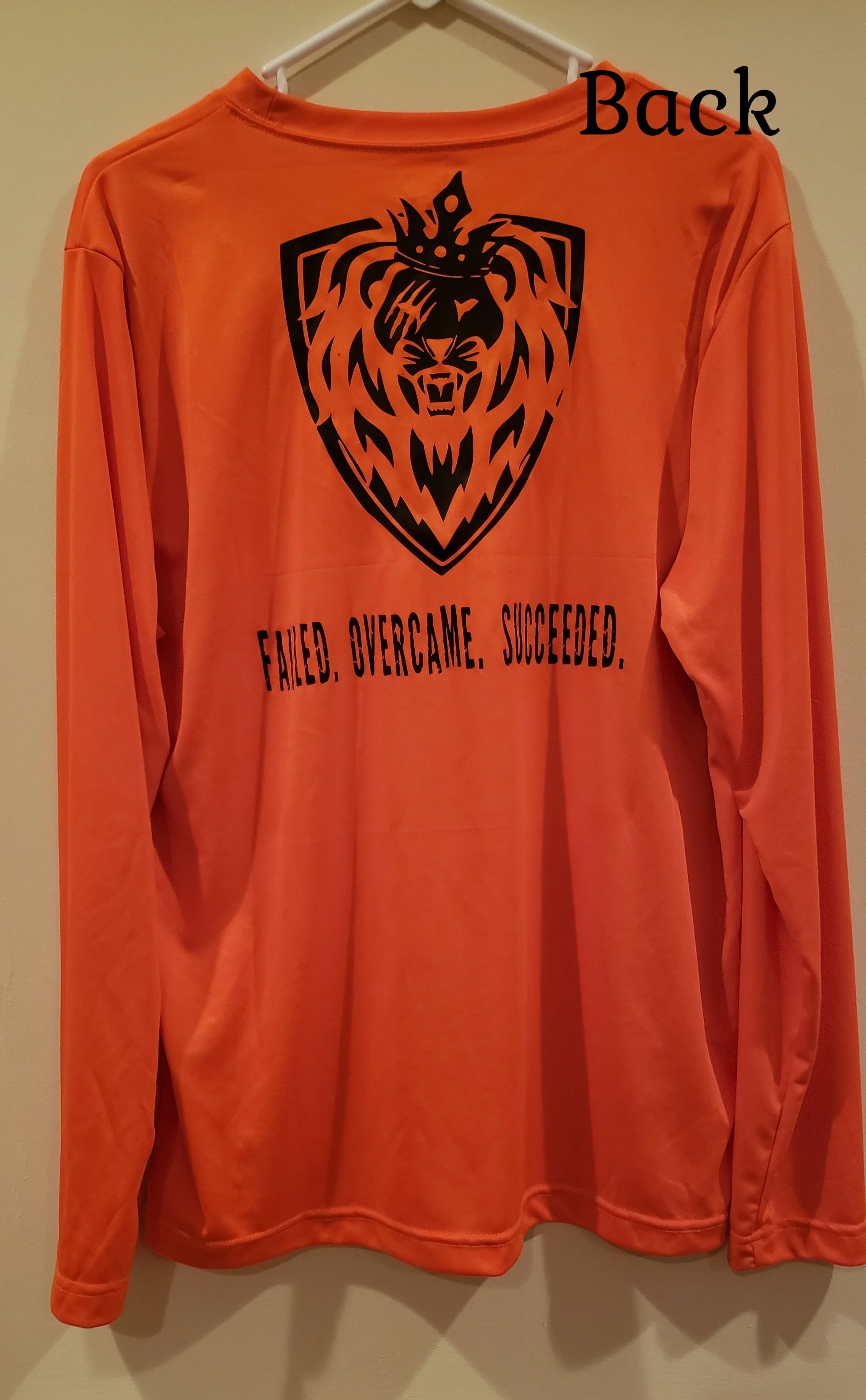 Men's "A Lion's Tale"  Performance Long Sleeve Tee